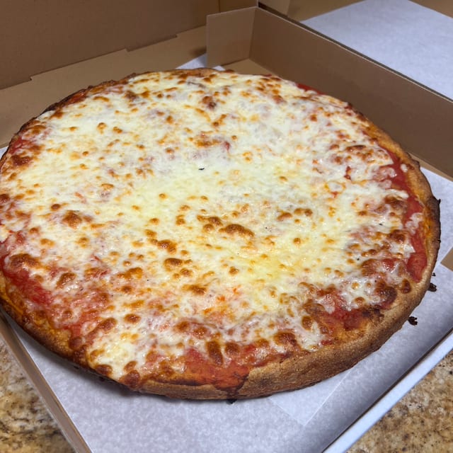 Deep dish Cheese Pizza.